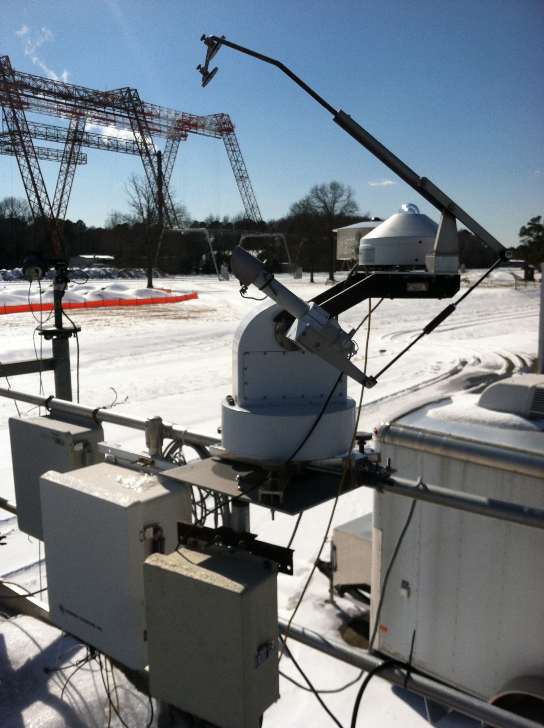 The BSRN-LRC sun tracker at the NASA Langley Research Center on a snowy day (02/20/2015)